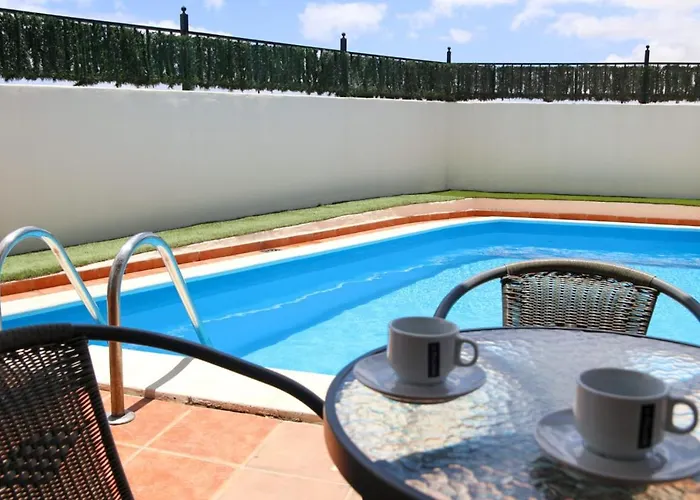 Con Piscina Cerca De Dunas De 別荘 *